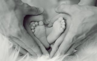 Baby feet and parents hands-foreign non-grantor trust